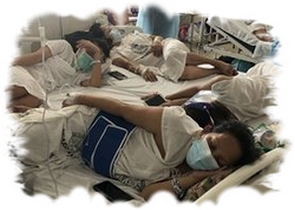Person in a hospital bed.
