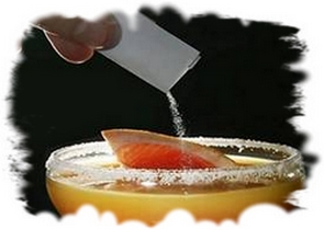 Picture of a drug being poured into a drink.